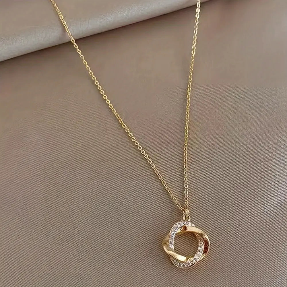 Gouden hanger met inlegwerk van imitatiediamanten voor dames