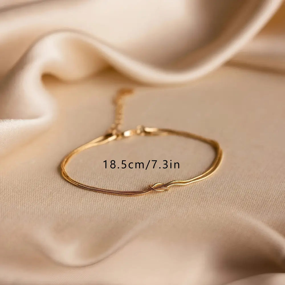 Simple And Stylish Stainless Steel Knot Bracelet For Couples, Plated In Golden Color