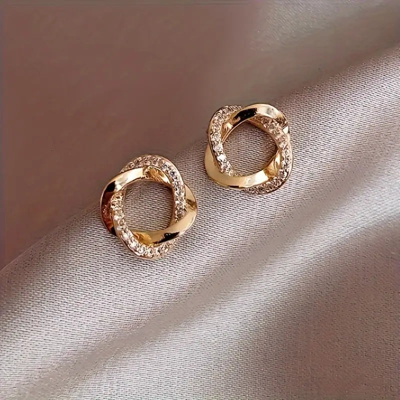 Elegante Twist-oorbellen – Goudkleurige legering met roestvrijstalen staafjes – Modesieraden (1 paar)