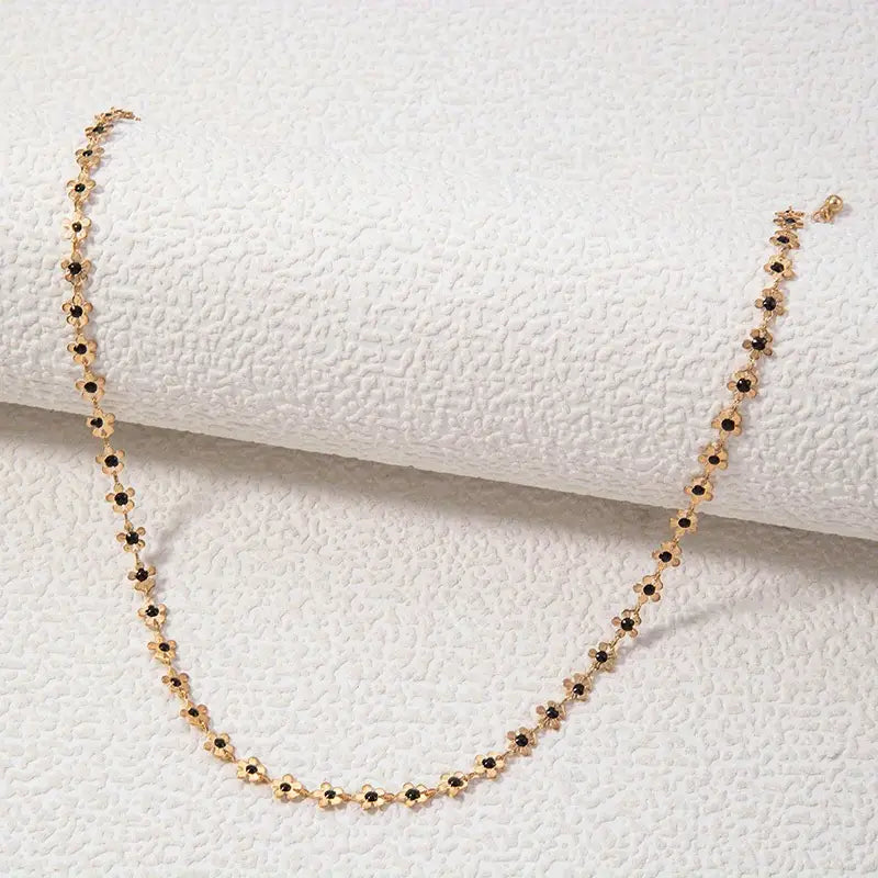 Collier élégant à breloques tournesol doré