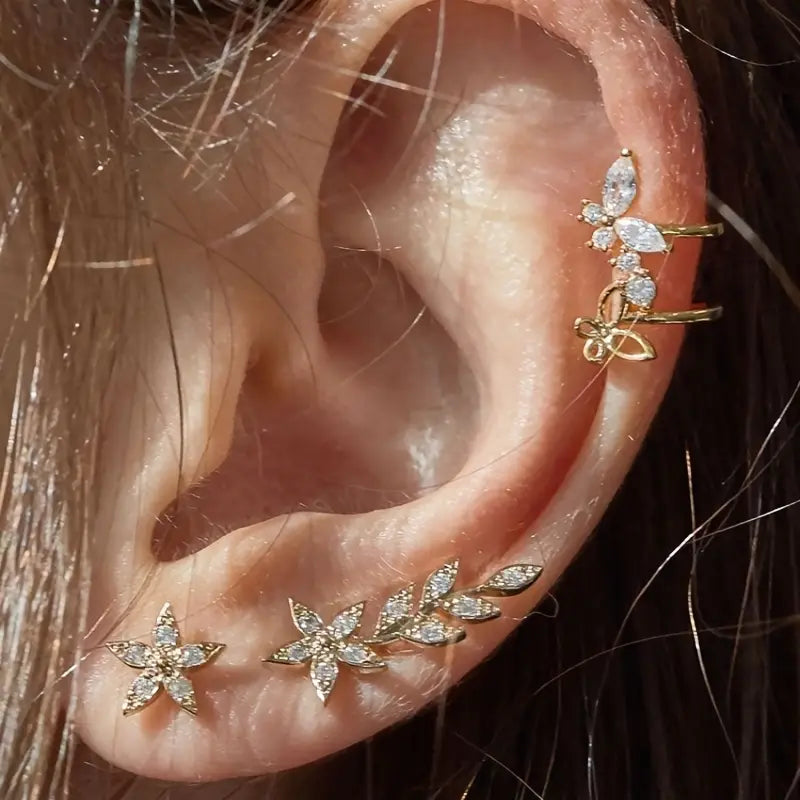 Lot de 4 boucles d'oreilles creuses créatives en cristal, motif papillon, étoile et feuille