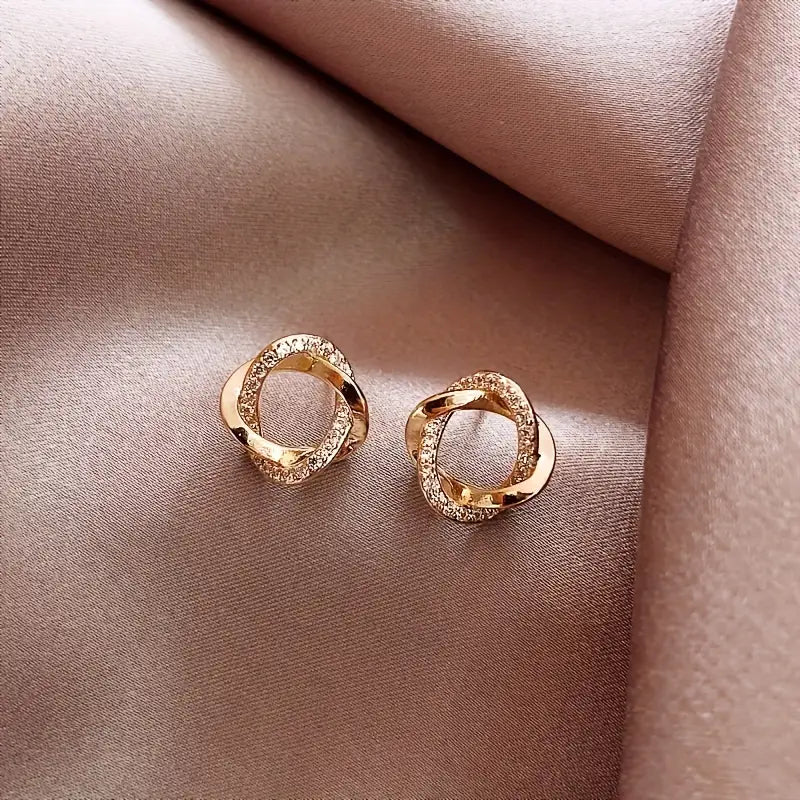 Elegante Twist-oorbellen – Goudkleurige legering met roestvrijstalen staafjes – Modesieraden (1 paar)