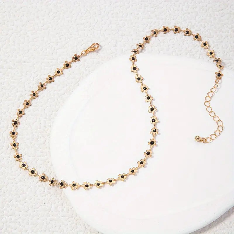 Collier élégant à breloques tournesol doré
