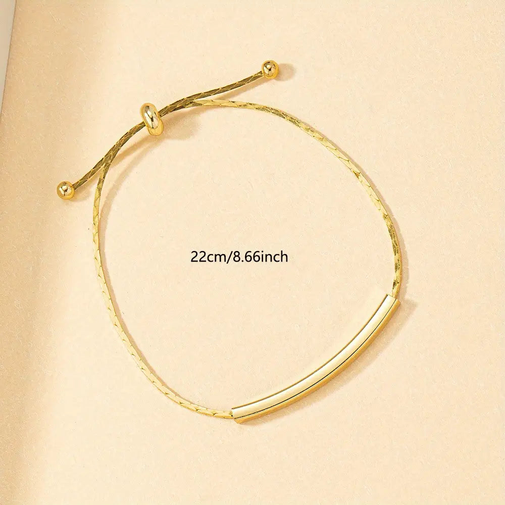 Minimalist Style Golden Metal Bracelet With A Unique Retractable Design.