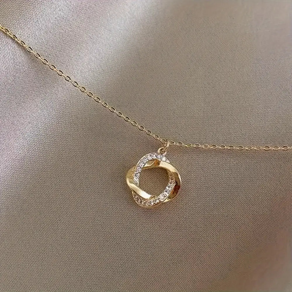 Gouden hanger met inlegwerk van imitatiediamanten voor dames