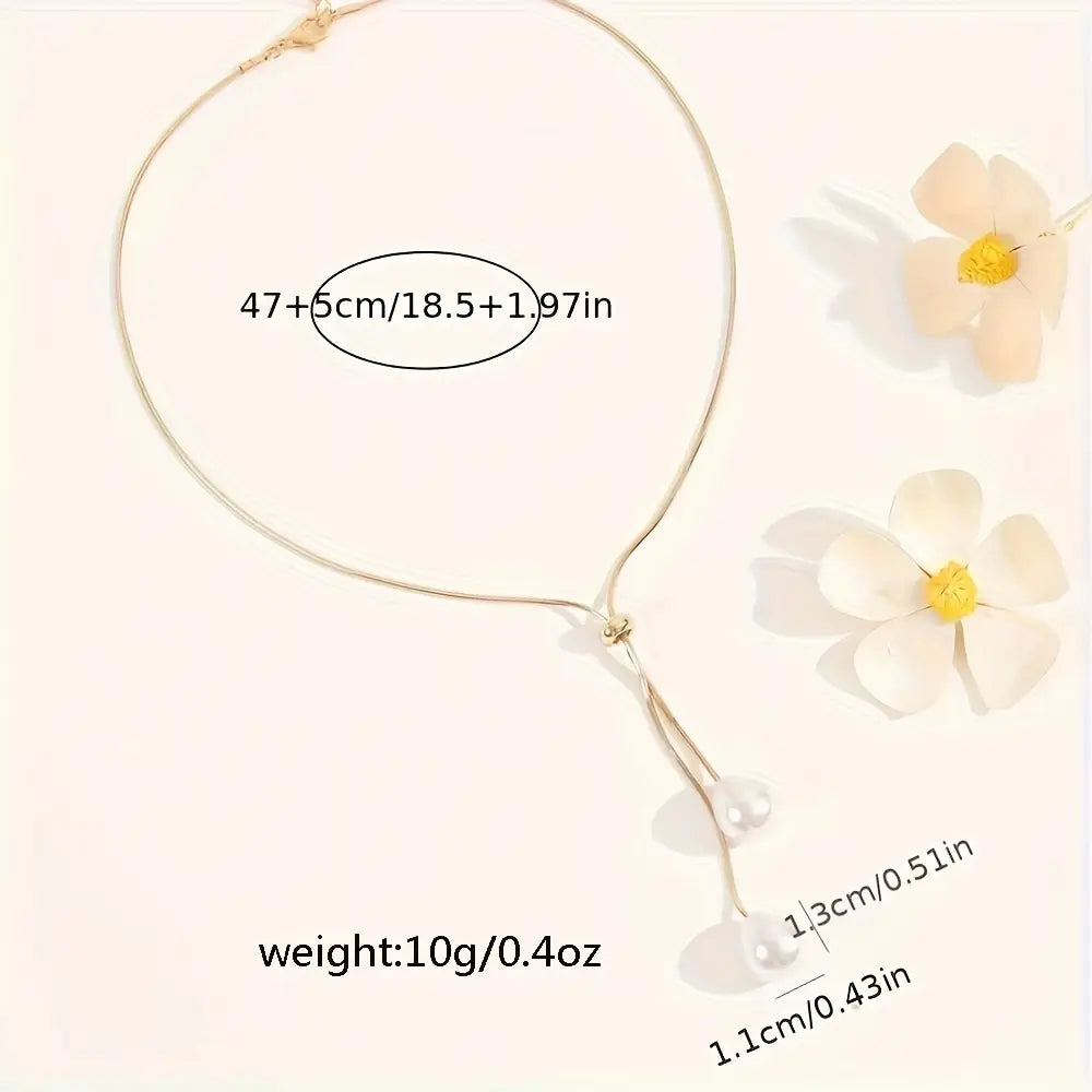 Collier ajustable élégant aux tons dorés avec pendentif unique en perles semi-percées