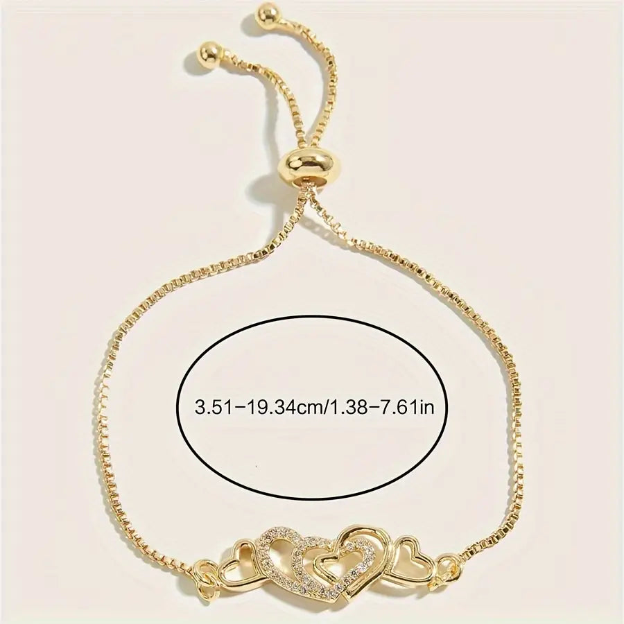 Gold-Tone Bracelet with Dazzling Heart Charms