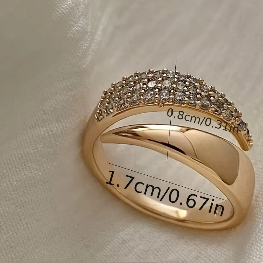 Bague ouverte en cuivre et zircone avec un design d'aile pointue