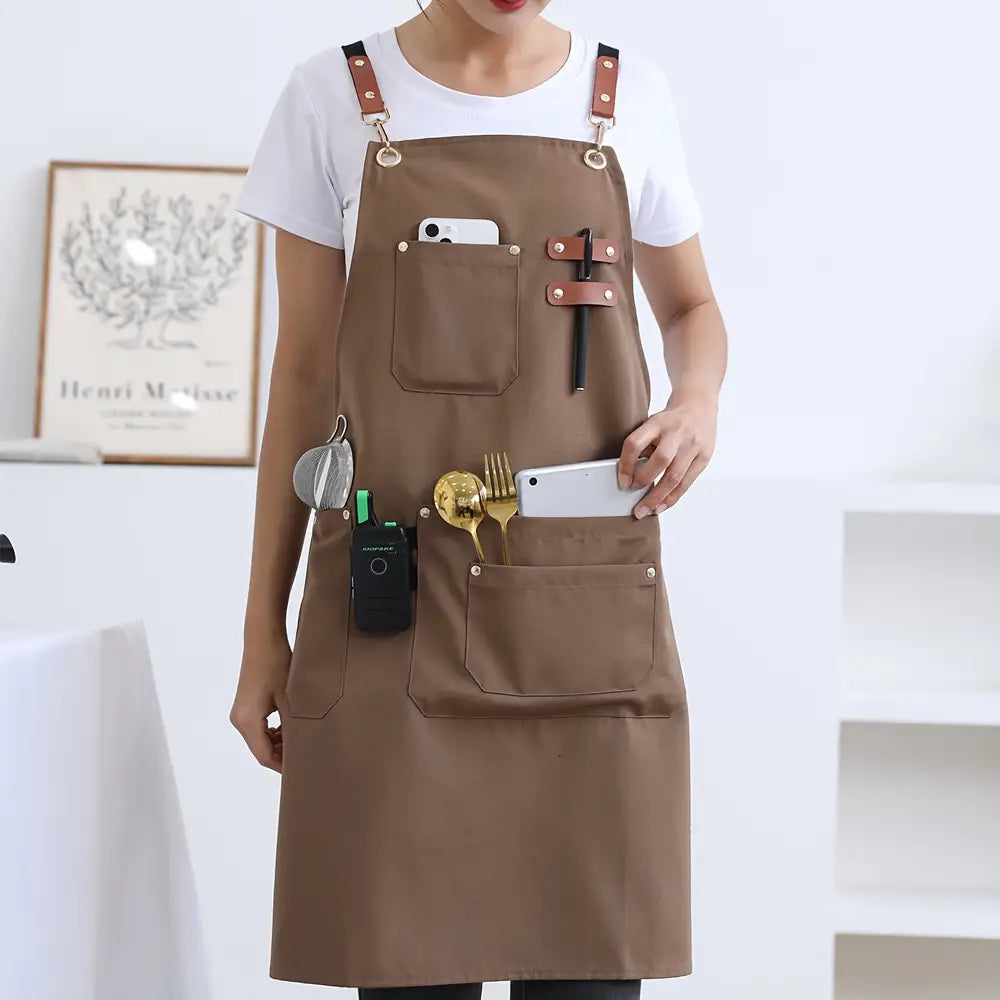 Tablier imperméable en toile de haute qualité au design moderne avec quatre poches