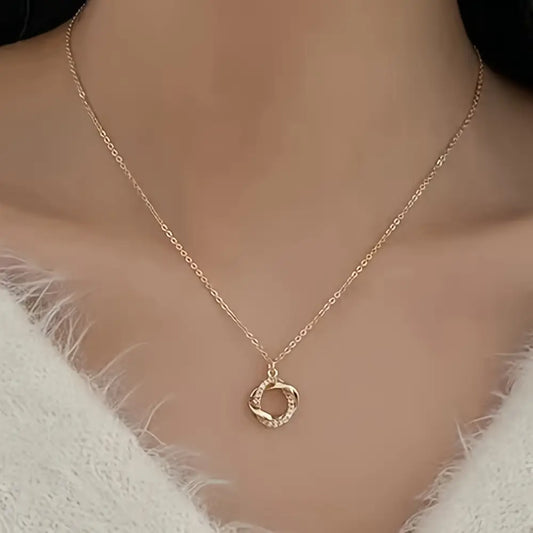 Gouden hanger met inlegwerk van imitatiediamanten voor dames
