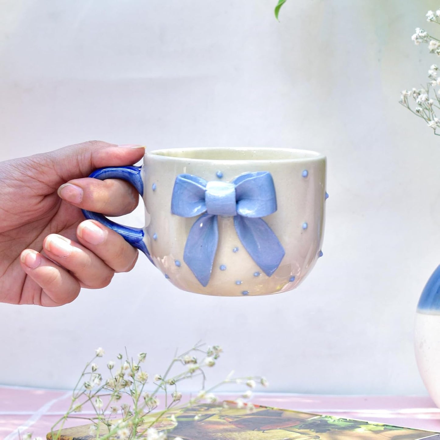 Artisan Ceramic Mug Blue Bow – Beverage Serveware – Handcrafted Clay – 220 ML