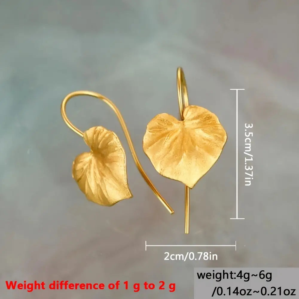 Boucles d'oreilles pendantes créatives en forme de feuille