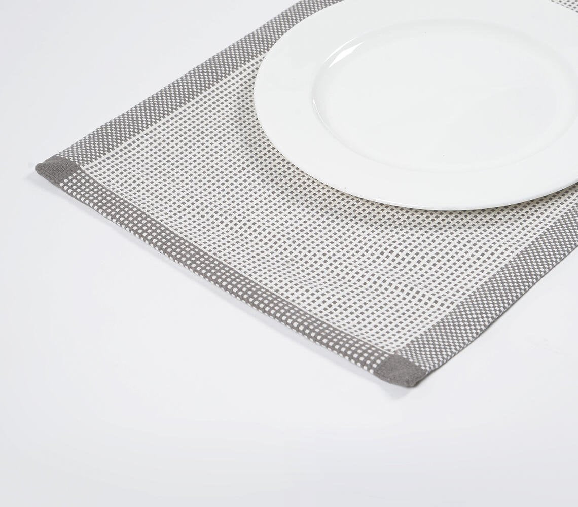 Handgemaakte ingelijste monochrome katoenen placemat